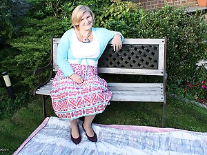 Naughty mature slut fucking a toy boy in the garden