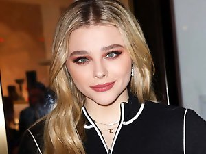 Older mom is taking off her dress