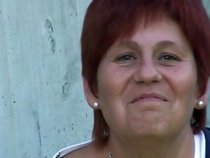 Awesome-looking old housewife is taking off her panties