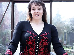 Big breasted british housewife getting wet