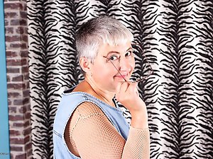 Hairy mature lady playing with herself